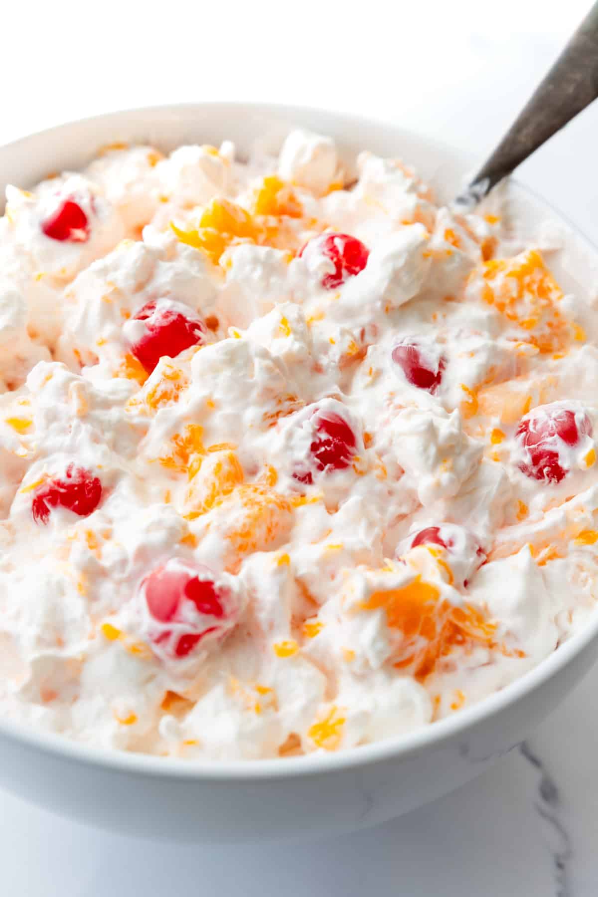 Close up of creamy ambrosia salad.
