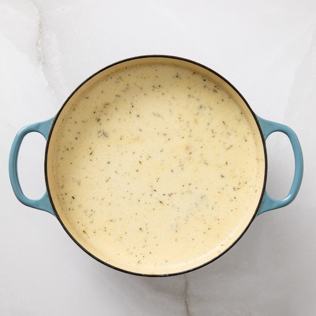 Clam chowder in a Dutch oven.