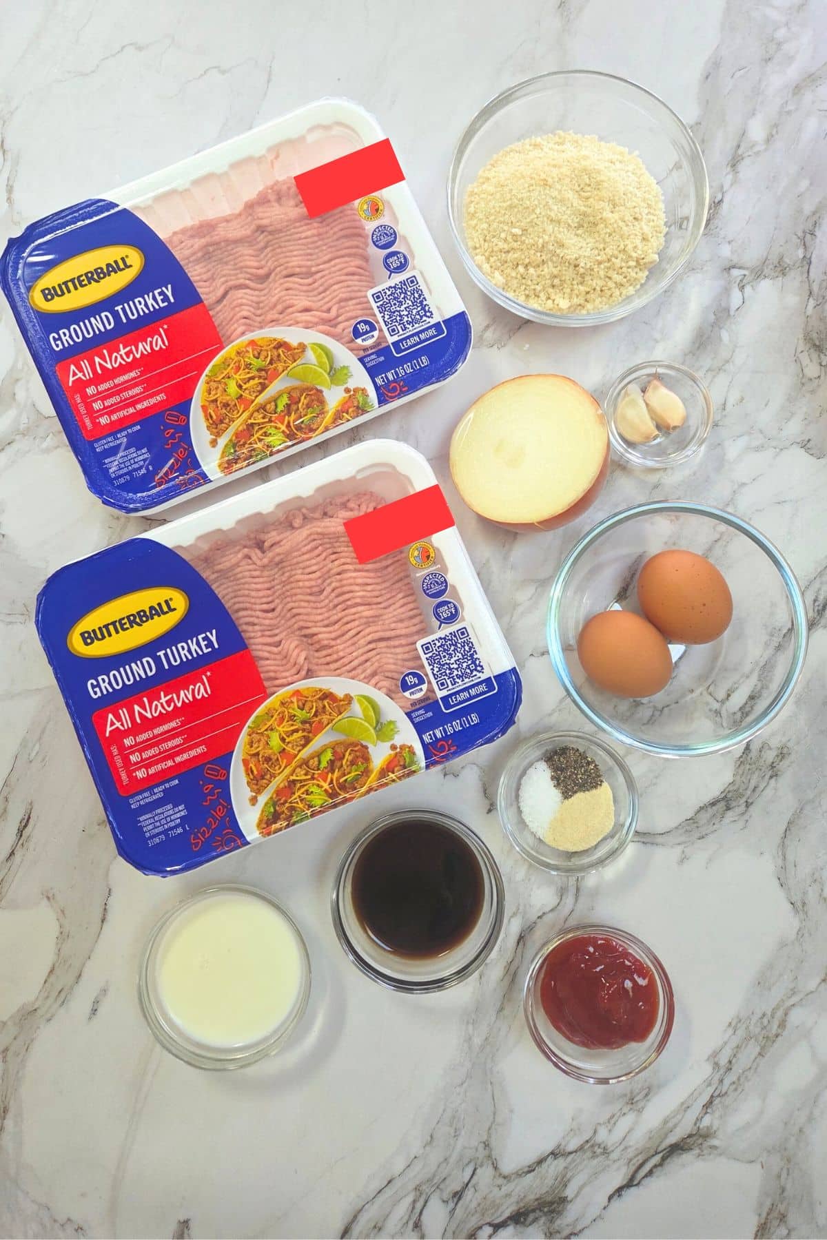 Ingredients used to prepare turkey meatloaf laid out.