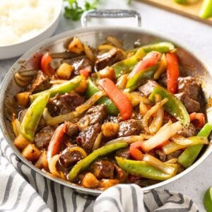 a skillet of sweet and sour beef