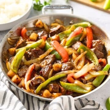 a skillet of sweet and sour beef