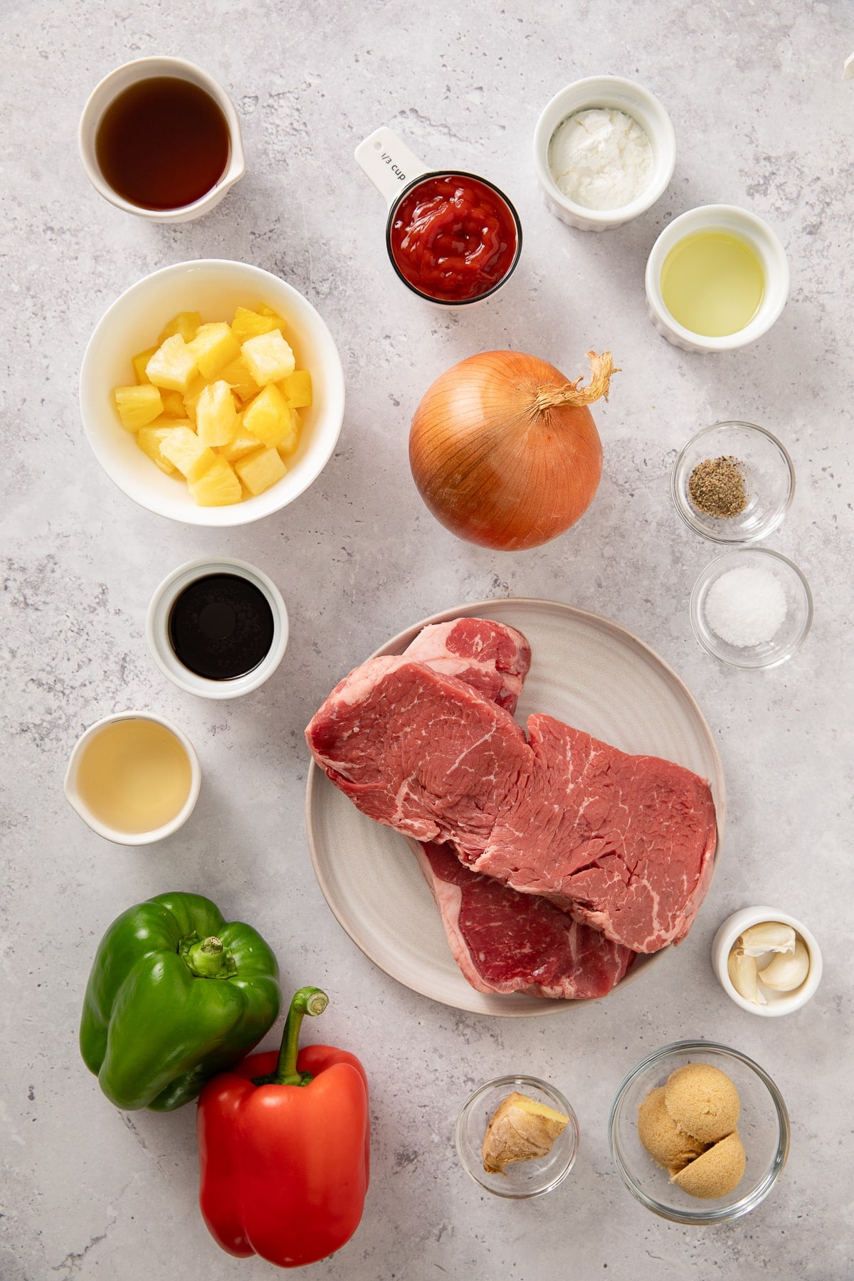 Ingredients for sweet and sour beef recipe on a table
